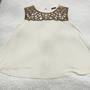 VENUS Cream Top with Copper tone Lattice Detail.